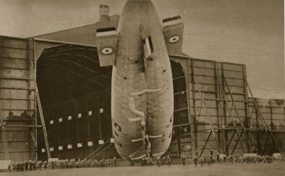 Negotiating a naval airship into a hangar, 1914-19 by English Photographer